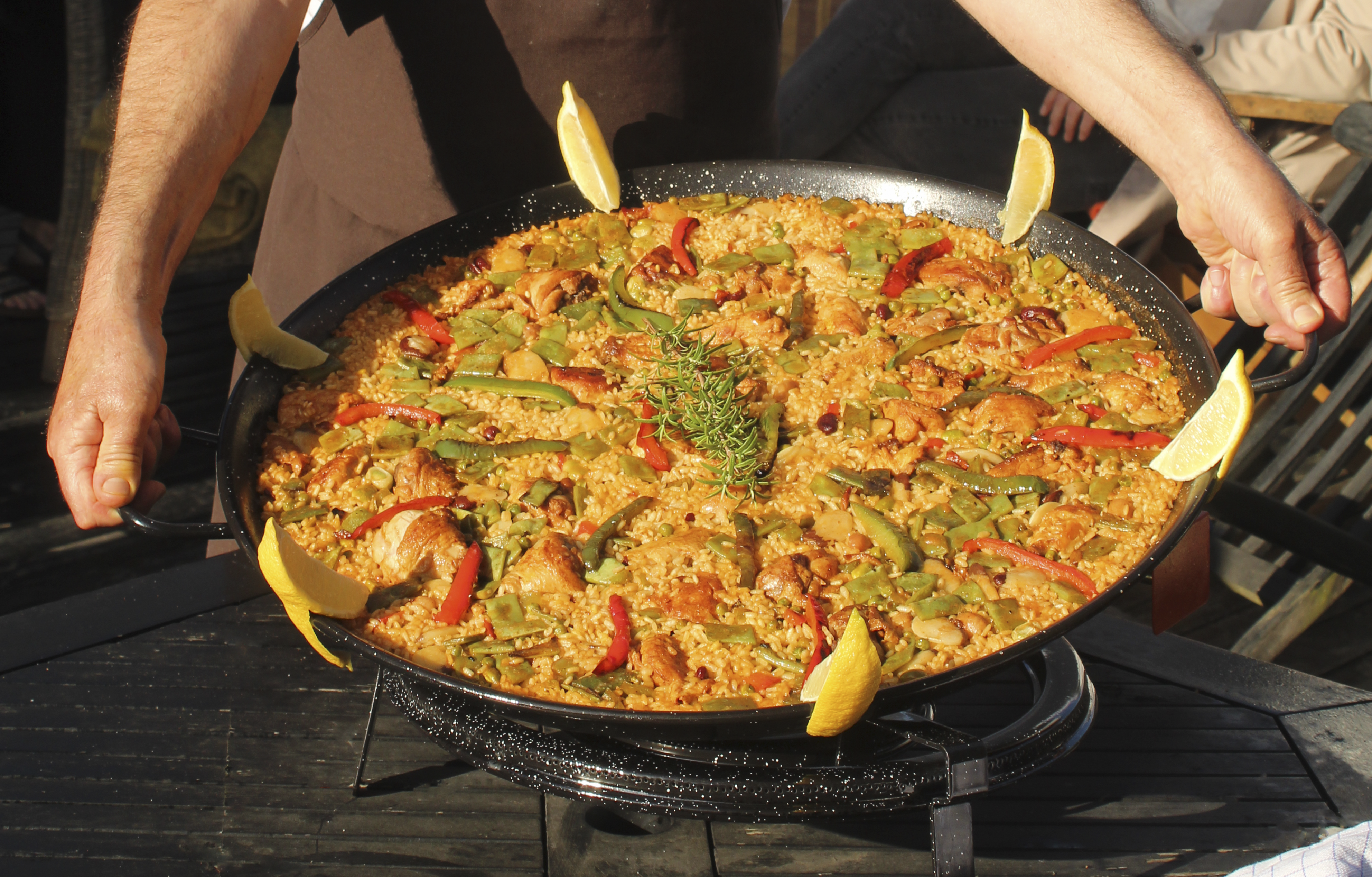 Pedro presenting paella picture